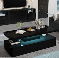 a modern living room with a black coffee table